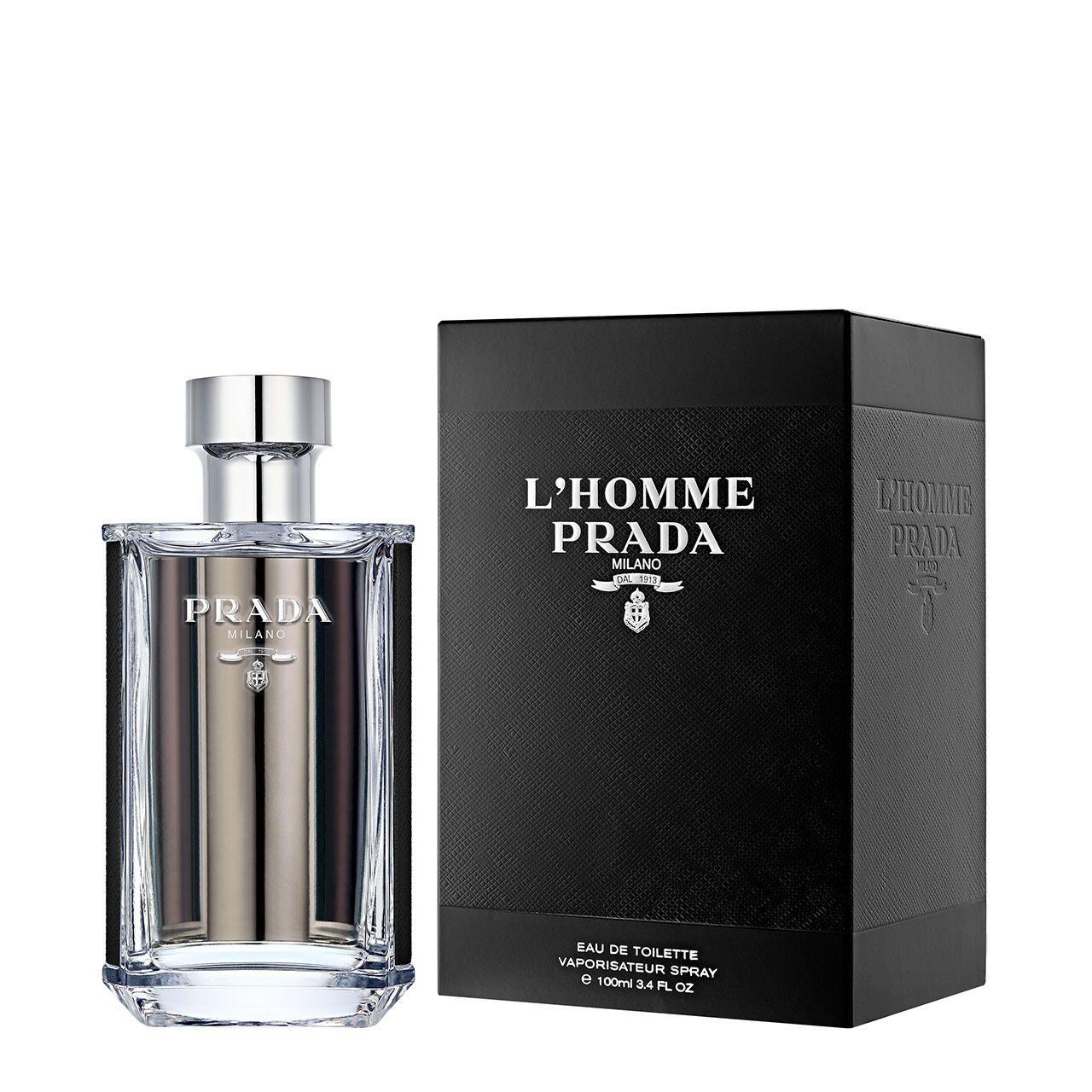 Flacone e confezione Prada L'Homme Eau de Toilette. Confezione nera con logo. Flacone trasparente con tappo argentato.