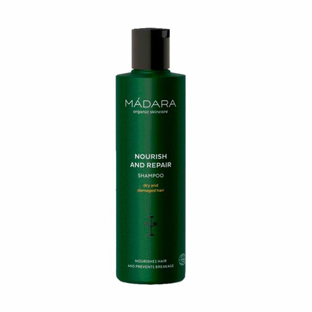 Flacone di shampoo verde con tappo nero. Scritta: MÁDARA, Nourish and Repair Shampoo, per capelli secchi e danneggiati.