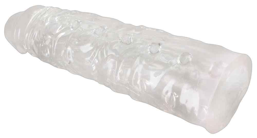 Custodia per pene trasparente con borchie. Progettato per l'allungamento del pene. Struttura superficiale con piccole protuberanze.