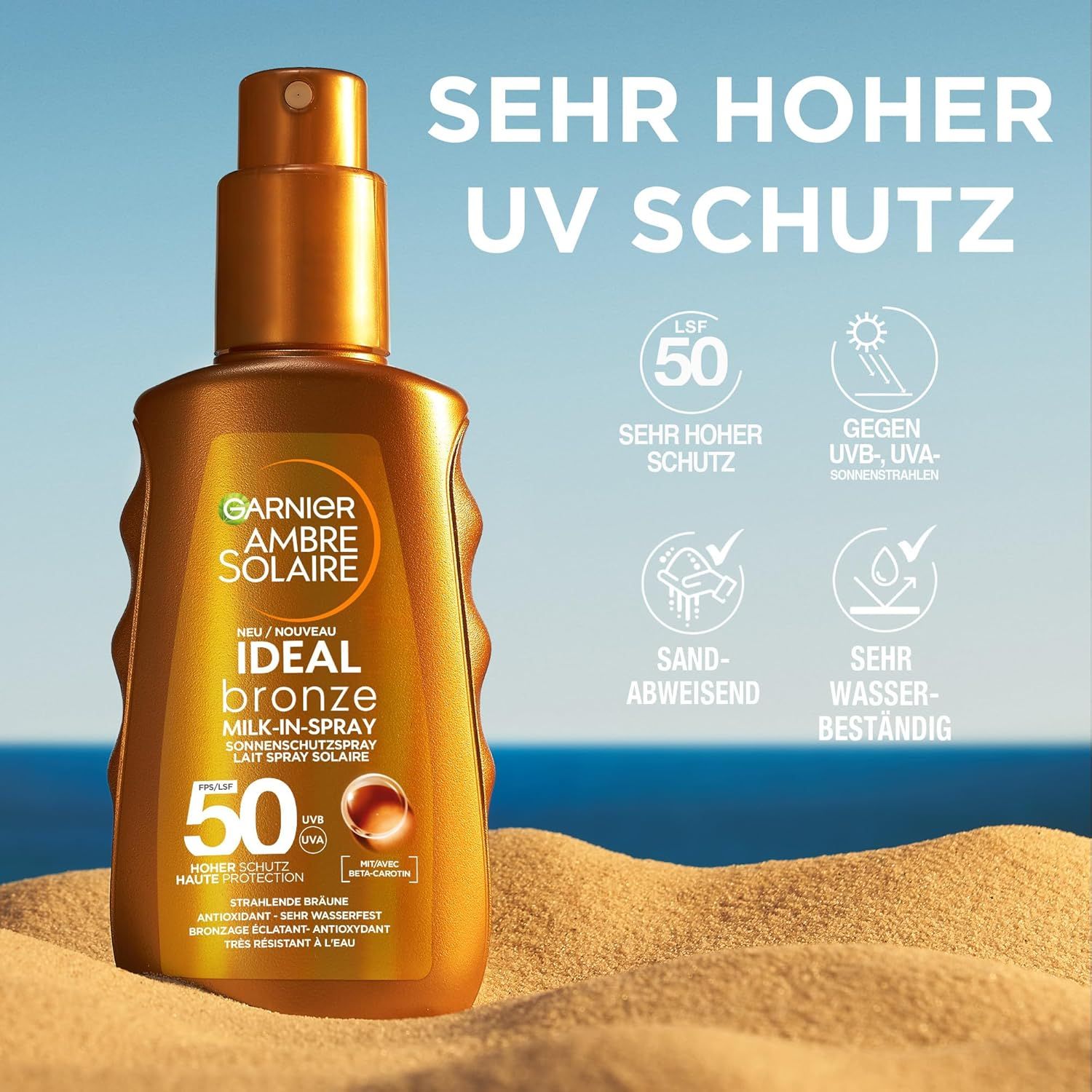 Garnier Ambre Solaire Ideal Bronze Milk-in-Spray 50. Flacone dorato, spray. Testo: Protezione UV molto alta, SPF 50, resistente alla sabbia, resistente all'acqua.