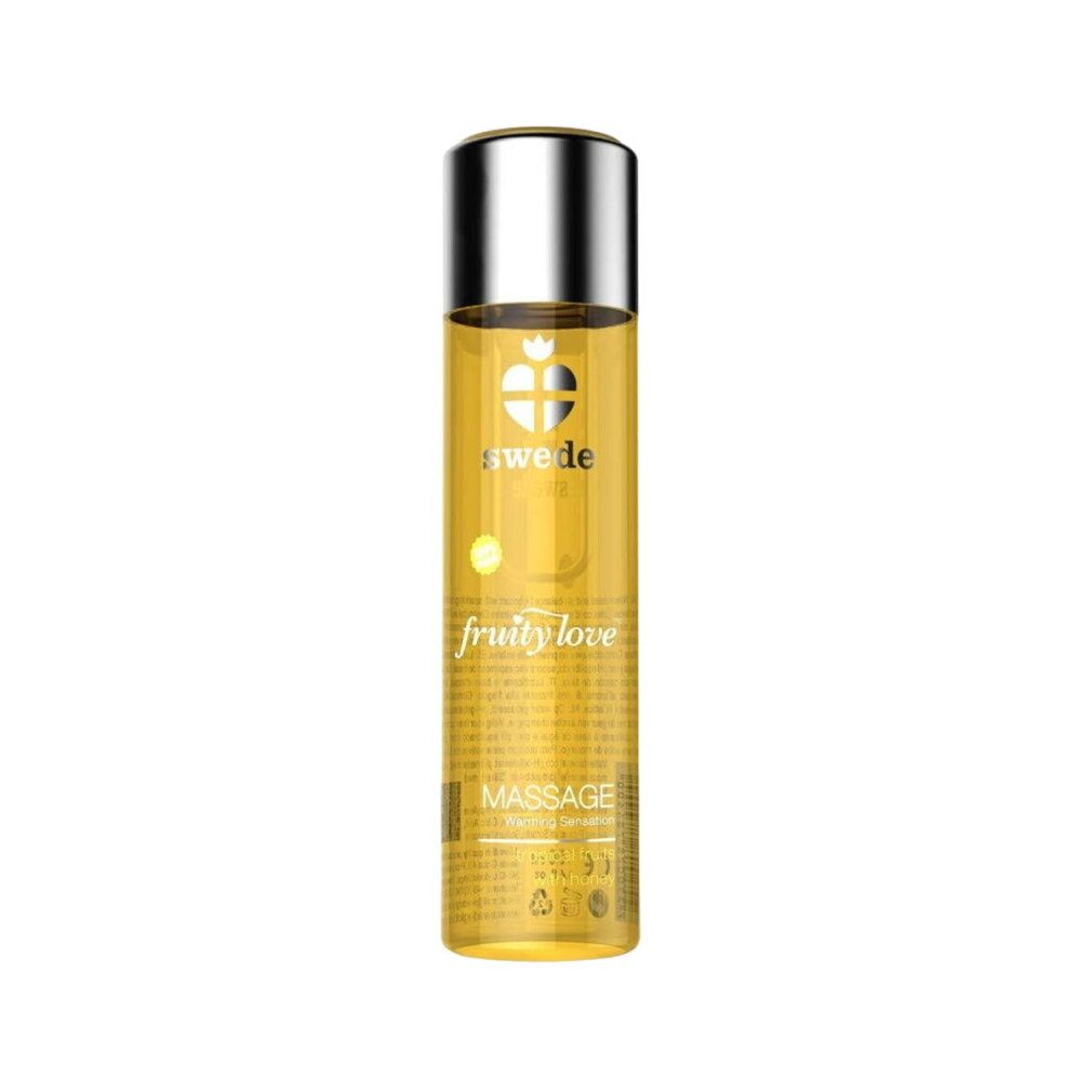 Flacone cilindrico con tappo argentato. Scritte "swede", "fruity love" e "massage". Liquido giallo visibile.
