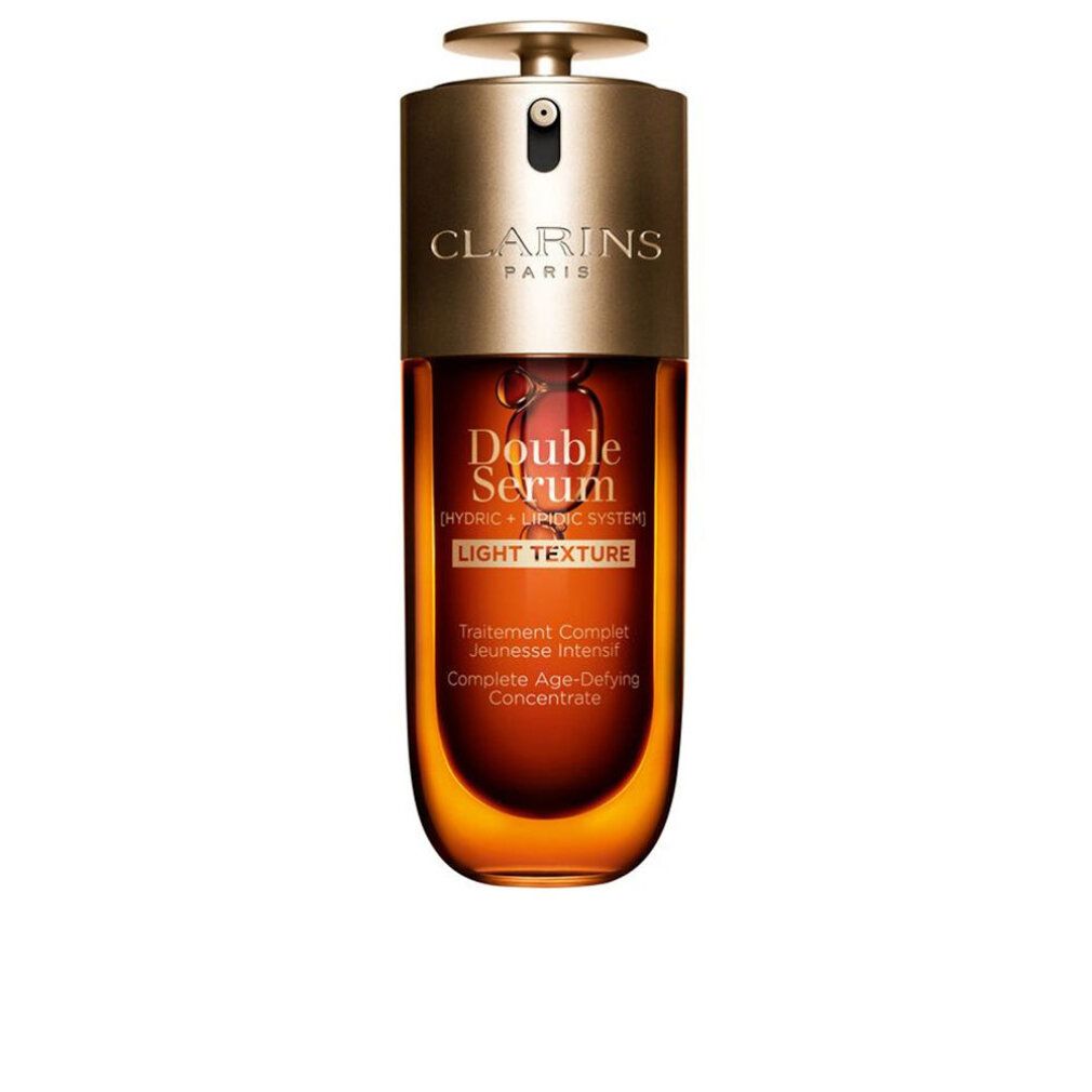Flacone marrone e oro. Scritte: Clarins, Double Serum, Light Texture.