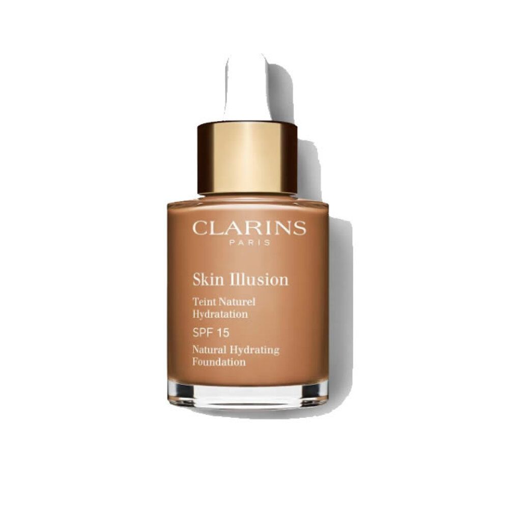 Flacone di fondotinta liquido. Scritta: Skin Illusion, Teint Naturel Hydratation, SPF 15. Marchio: Clarins.