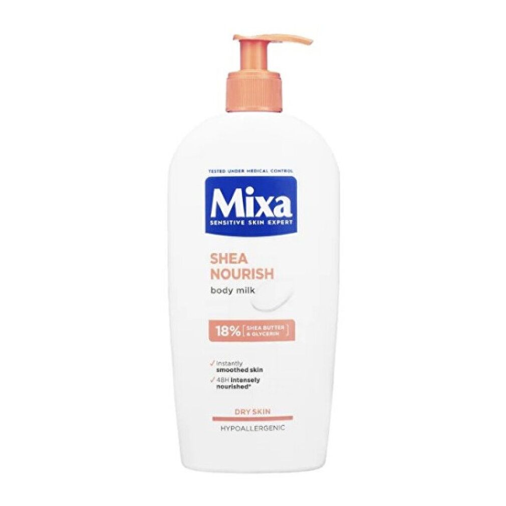 Flacone bianco con erogatore arancione. Scritta: Mixa, Shea Nourish, Body Milk, 18% burro di karité.