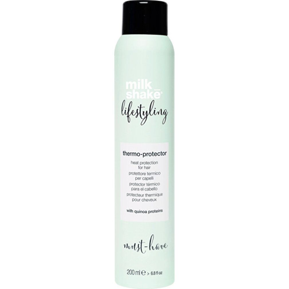 Flacone spray verde chiaro con tappo nero. Scritta: milk_shake, lifestyling, thermo-protector. Testo multilingue. In basso: must-have, 200 ml.