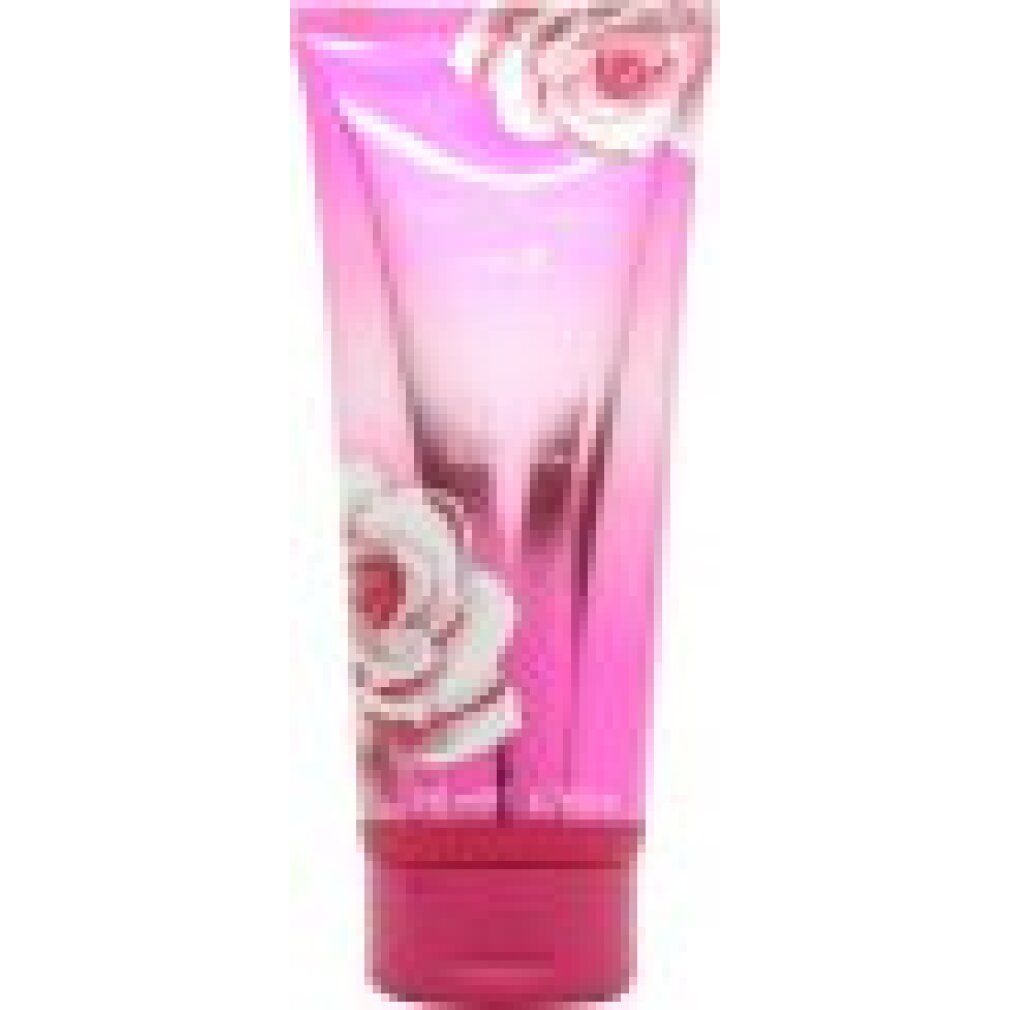 Tubo rosa con design floreale. Testo: Pink Flower, Perfumed Body Lotion. In basso: 200 ml, 6.76 fl oz.