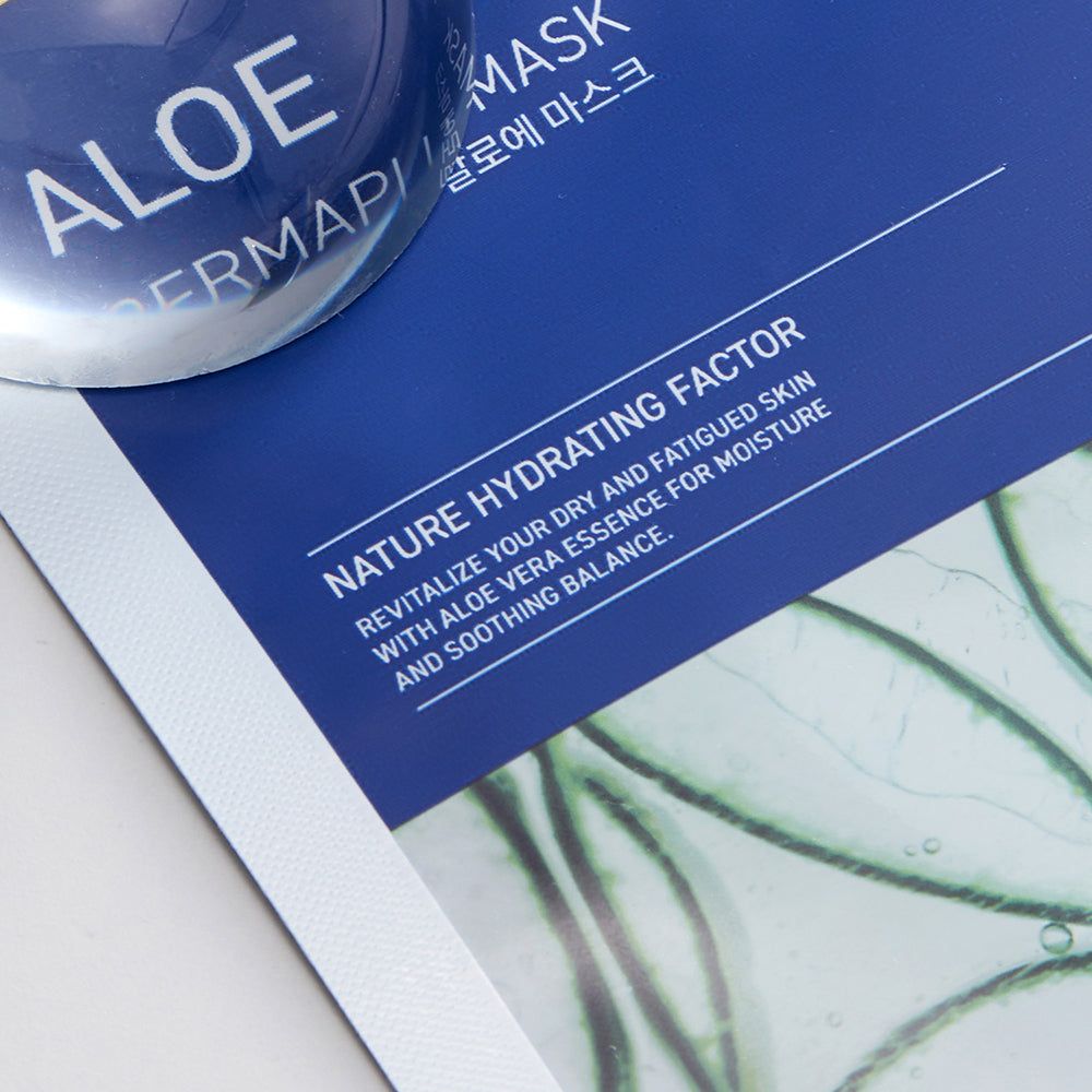 Confezione blu con testo "ALOE DERMAPLUS MASK" e motivo aloe vera.