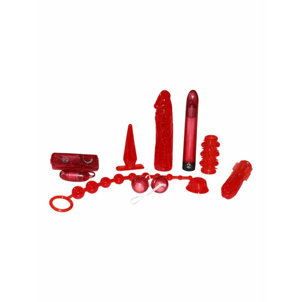 Set erotico rosso con vari ausili, vibratori e palline.