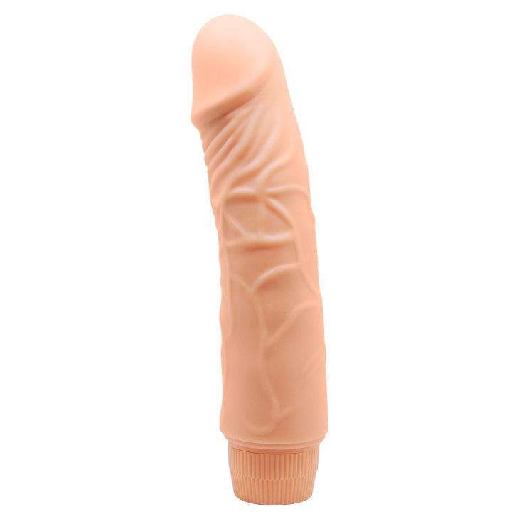 Dildo realistico beige, base scanalata, superficie dettagliata. Vene verticali sul fusto.