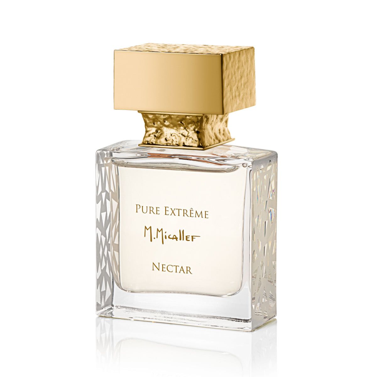 Flacone di profumo con tappo dorato. Scritta PURE EXTRÊME M.Micallef NECTAR. Forma rettangolare con motivo.