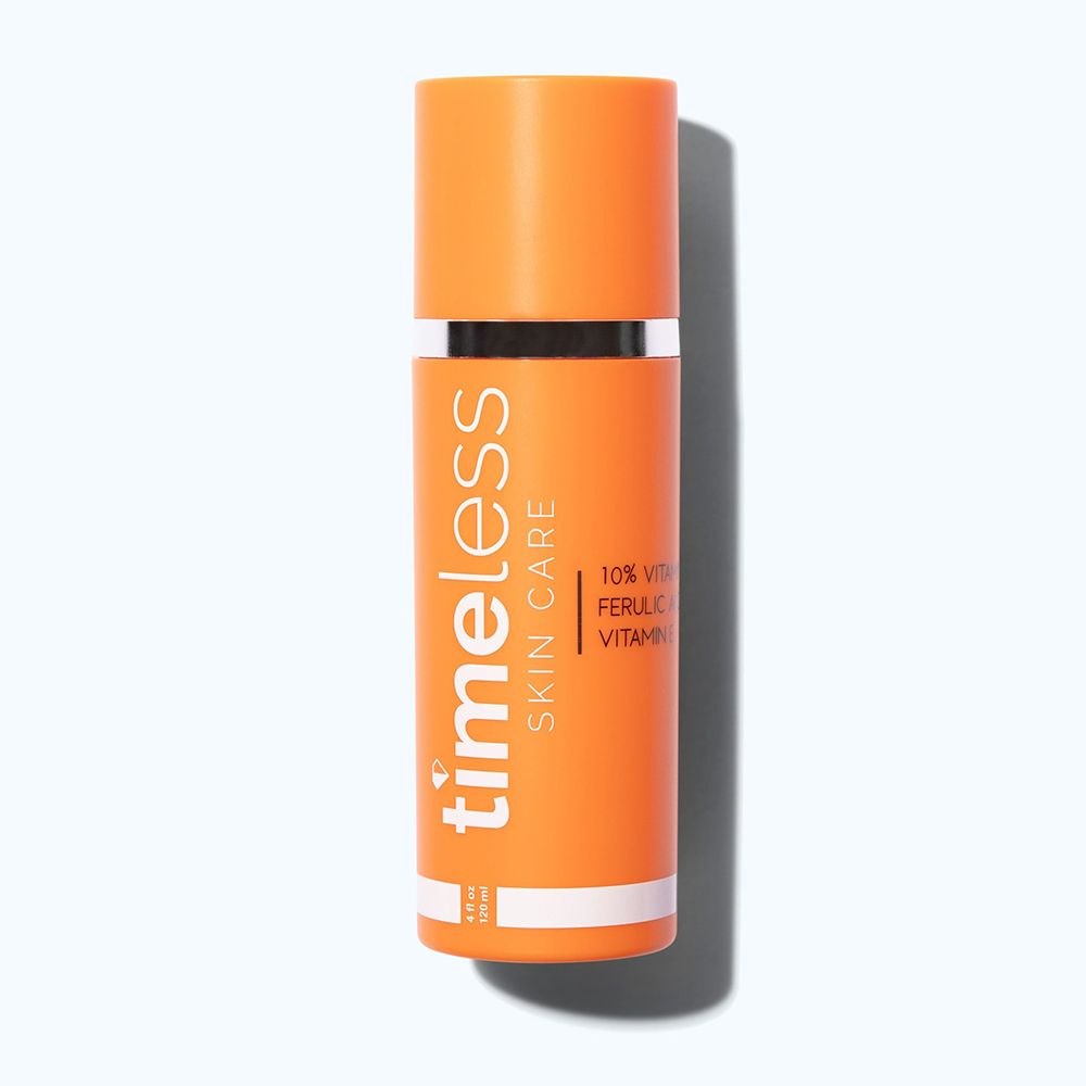 Flacone arancione con etichetta bianca. Scritta: Timeless Skin Care, 10% Vitamina C + E Acido Ferulico Vitamina E.