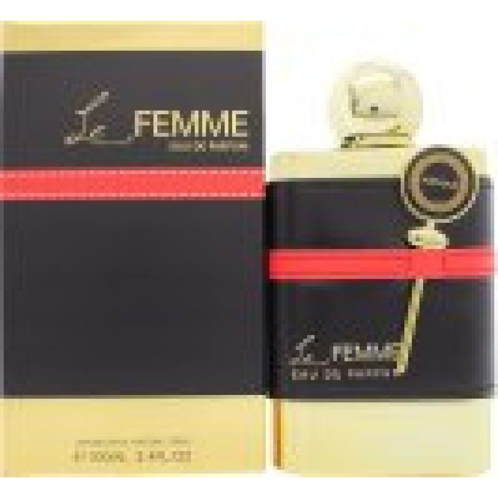 Flacone dorato con fascia in pelle nera e striscia rossa. Confezione nera con scritta dorata. Scritta: Le Femme.
