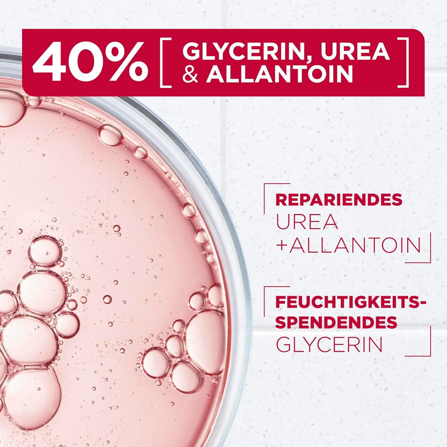 Primo piano del liquido. Testo: 40% Glicerina, Urea e Allantoina. Testo: Urea riparatrice + Allantoina.