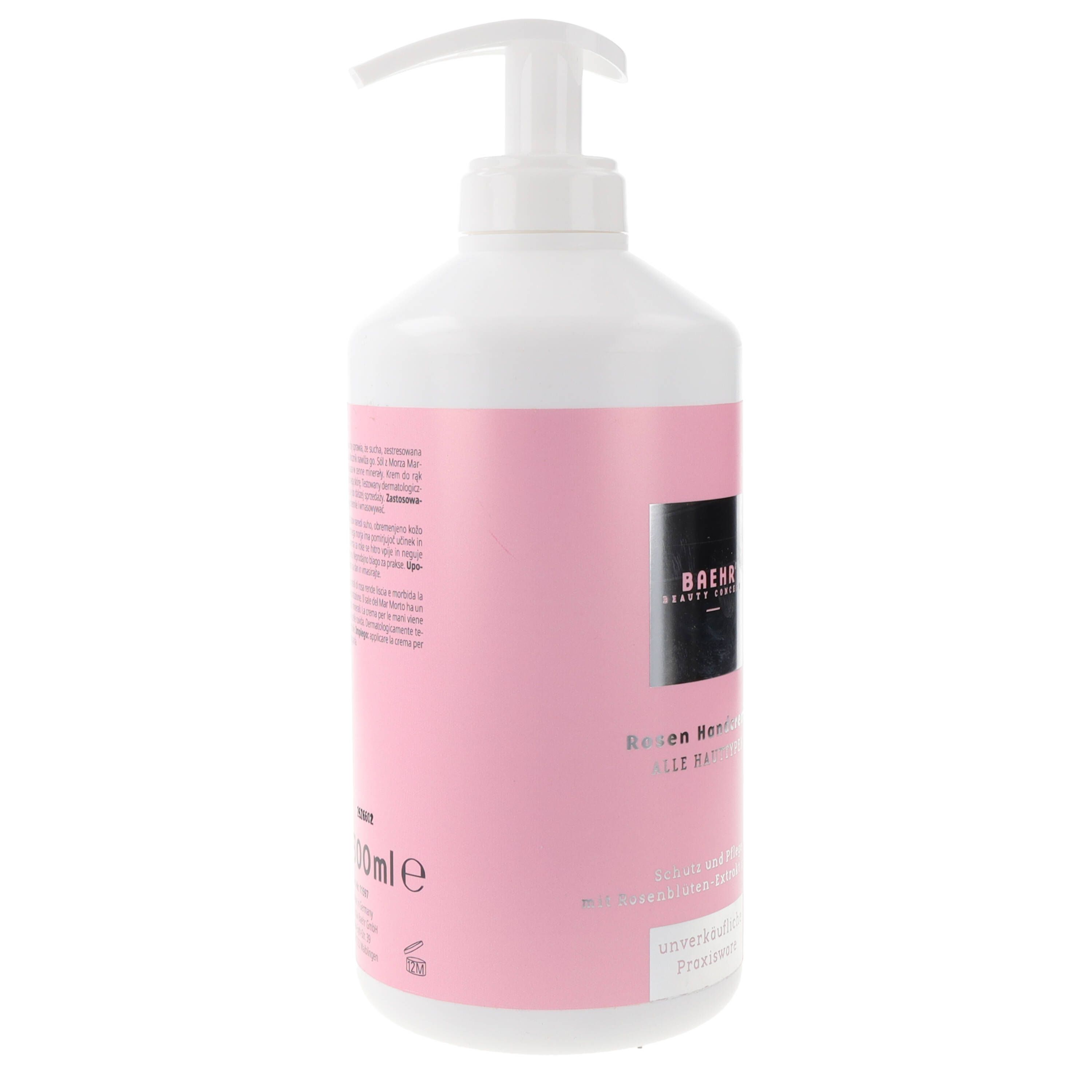 Flacone bianco con etichetta rosa e pompa. Vista posteriore con testo e indicazione del volume: 500ml. Nome del prodotto visibile.