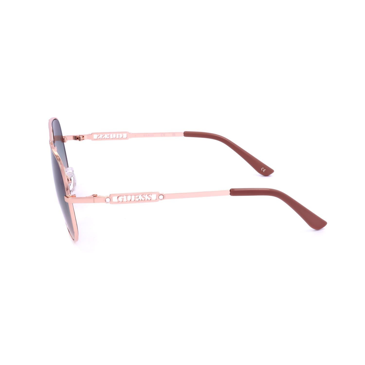 Occhiali da sole color oro rosa con aste marroni e logo Guess sull'asta.