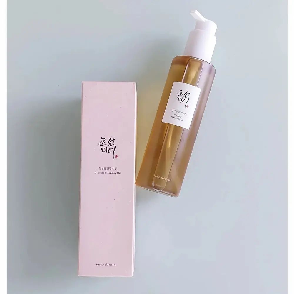 Flacone e confezione. Flacone con testo coreano e "Cleansing Oil". Confezione rosa.