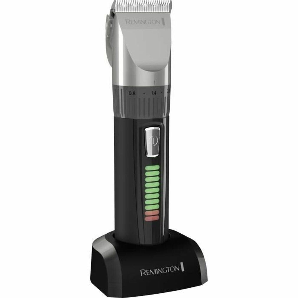 Tagliacapelli nero con base di ricarica. Indicatore batteria con barre verdi e rosse. Marchio: Remington.