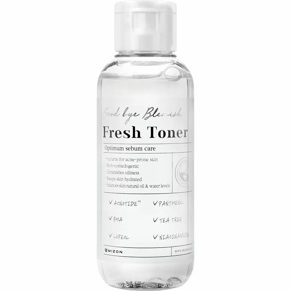 Flacone trasparente con tappo bianco. Scritta: Fresh Toner. Contiene ingredienti come BHA e Tea Tree.