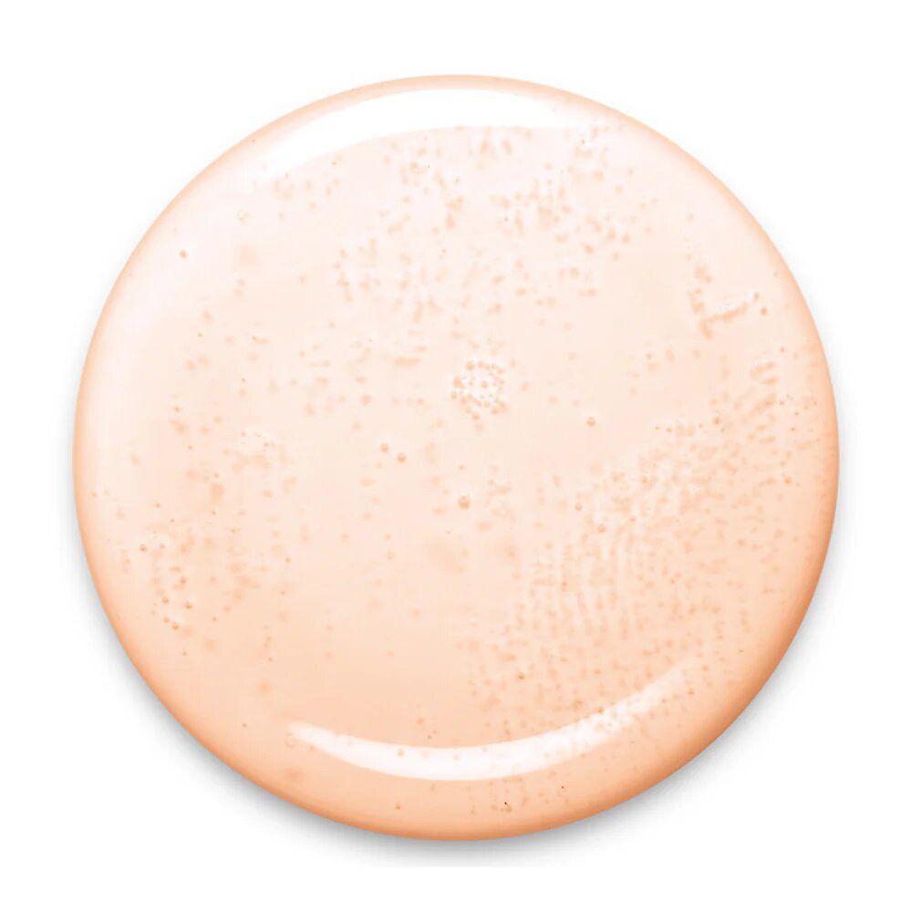 Macchia rotonda di smalto rosa chiaro. Superficie lucida. Nessun altro dettaglio visibile.