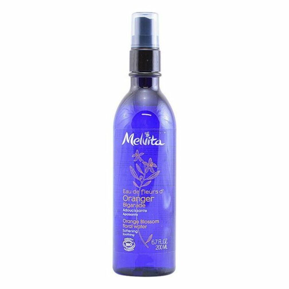 Flacone blu con vaporizzatore. Scritta: Melvita, Eau de fleurs d'Oranger, Orange Blossom floral water. Certificazione bio.