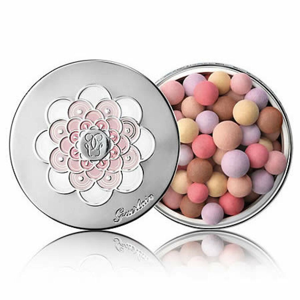 Barattolo aperto con perle. Coperchio con design floreale. Perle rosa, lilla, gialle e marroni. Testo: Guerlain. Superficie riflettente.