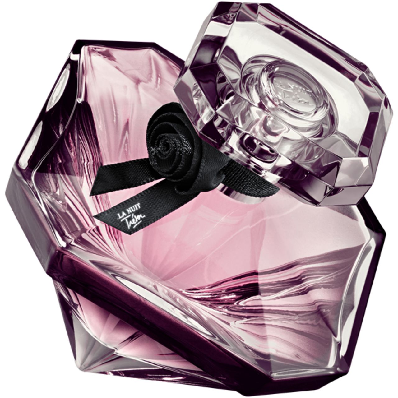 Flacone di profumo con fiocco nero. Flacone a forma di cristallo, tappo aperto con logo. Fiocco nero con scritta.