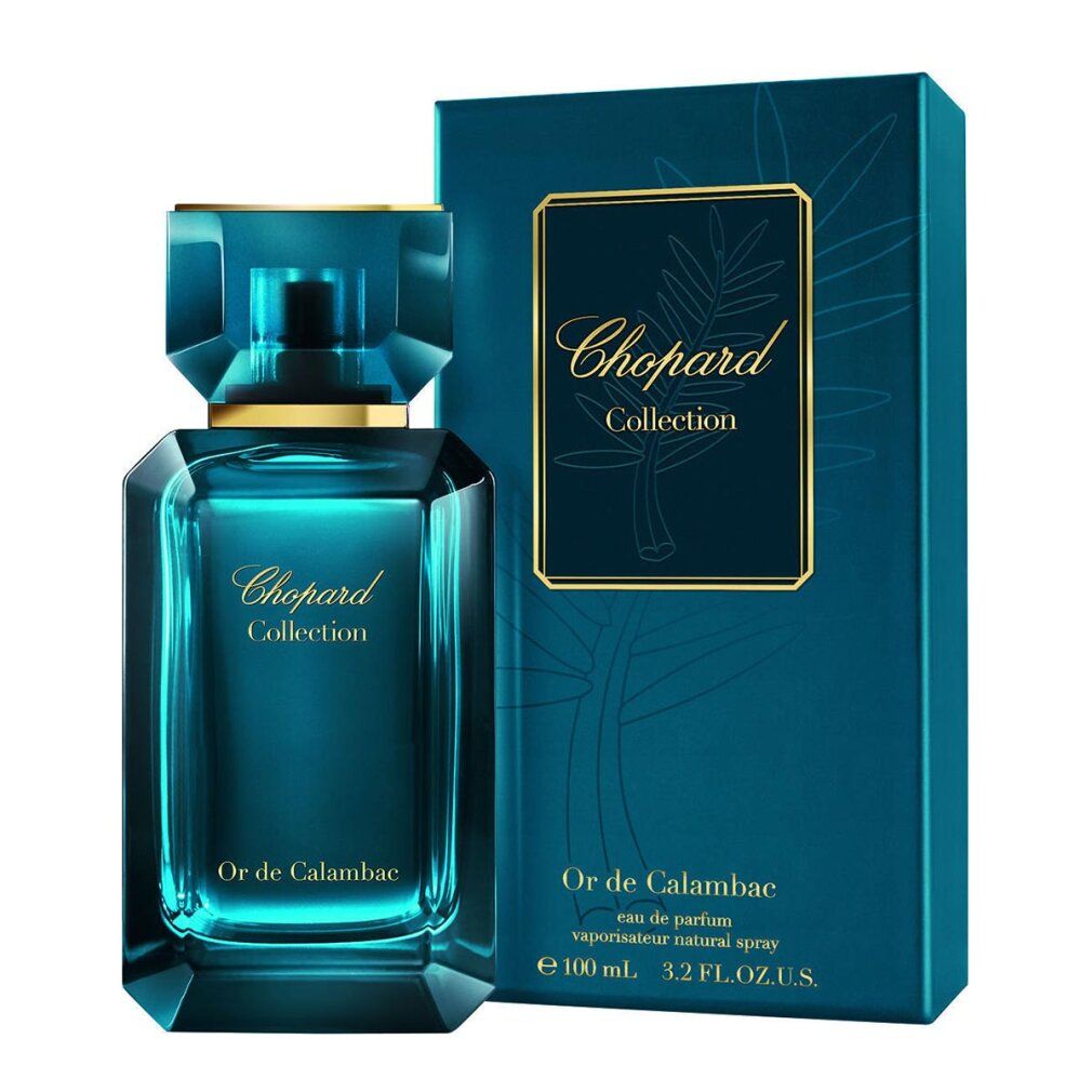 Flacone Chopard Collection Or de Calambac Eau de Parfum in vetro blu.