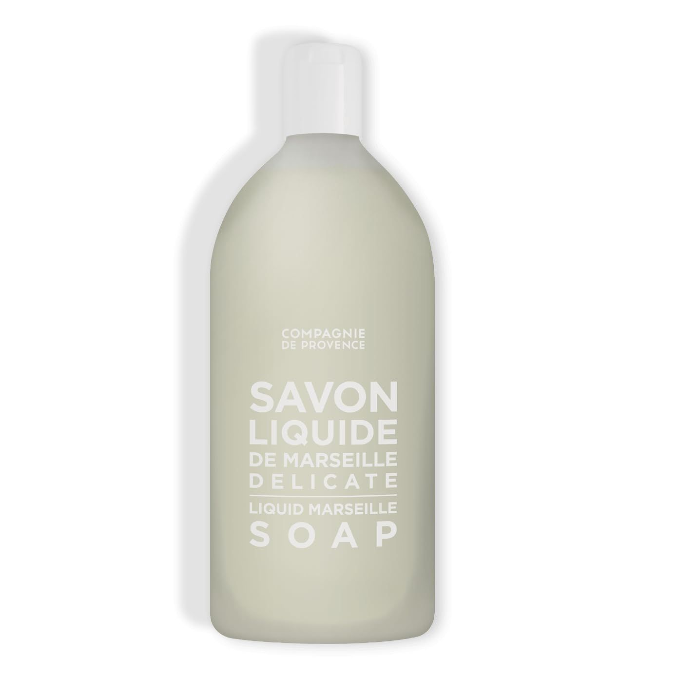 Flacone di sapone liquido bianco con tappo bianco. Testo: Savon Liquide, Delicate.