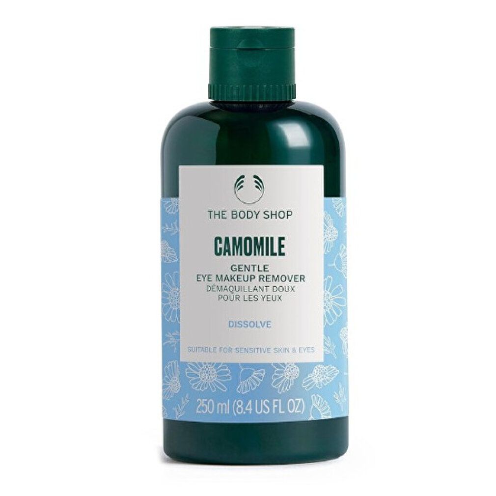 Flacone verde con etichetta blu. Scritta: CAMOMILE, Gentle Eye Make-Up Remover. 250 ml. Adatto alle pelli sensibili.