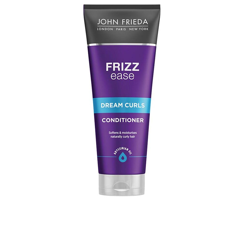 Conditioner John Frieda Frizz Ease Dream Curls. Tubo viola con testo blu. Contiene olio di Abissinia. Testo: Dream Curls, Conditioner.