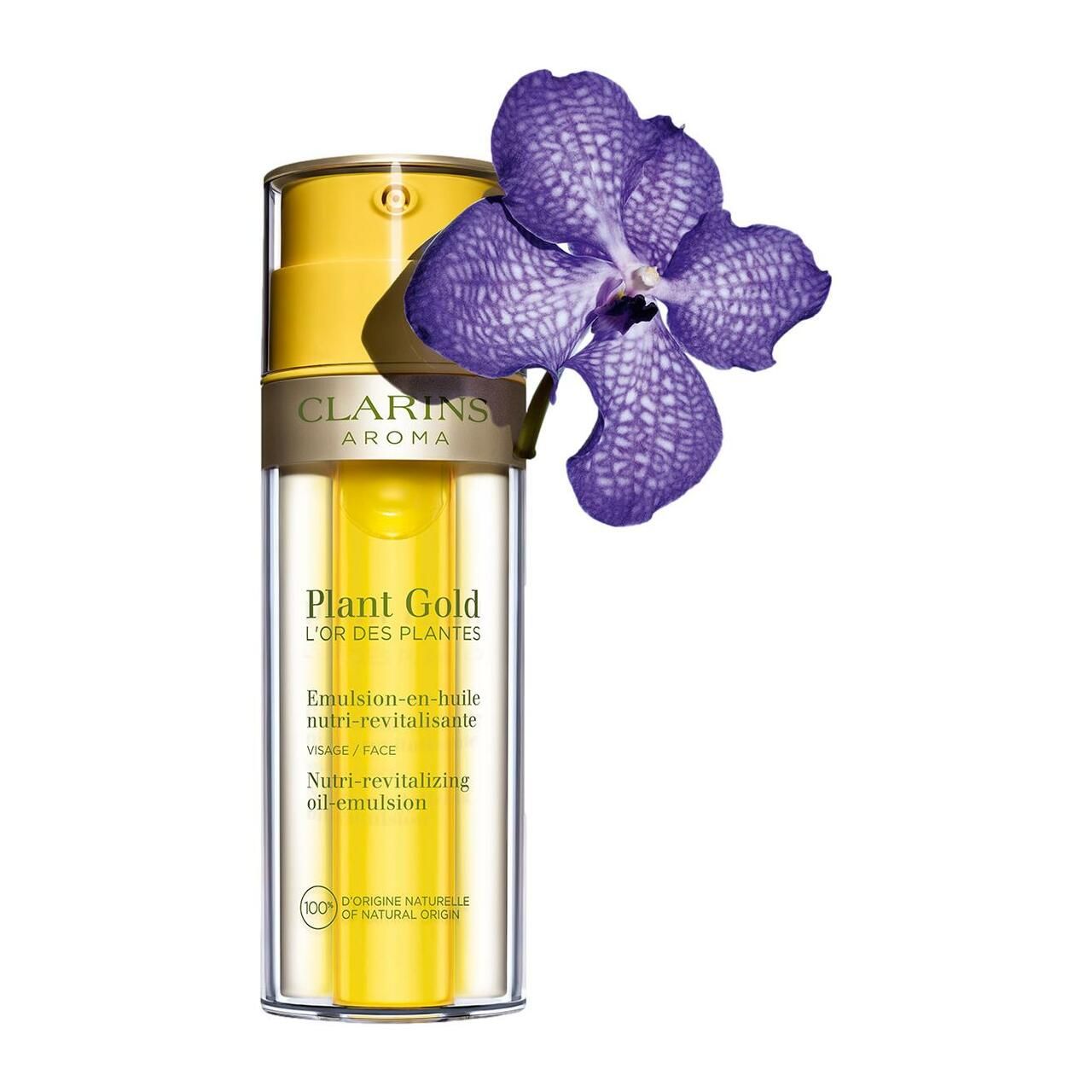 Clarins Plant Gold emulsione olio con orchidea viola. Flacone giallo con pompa, base trasparente. Testo: Emulsion-en-huile, Nutri-revitalisante.