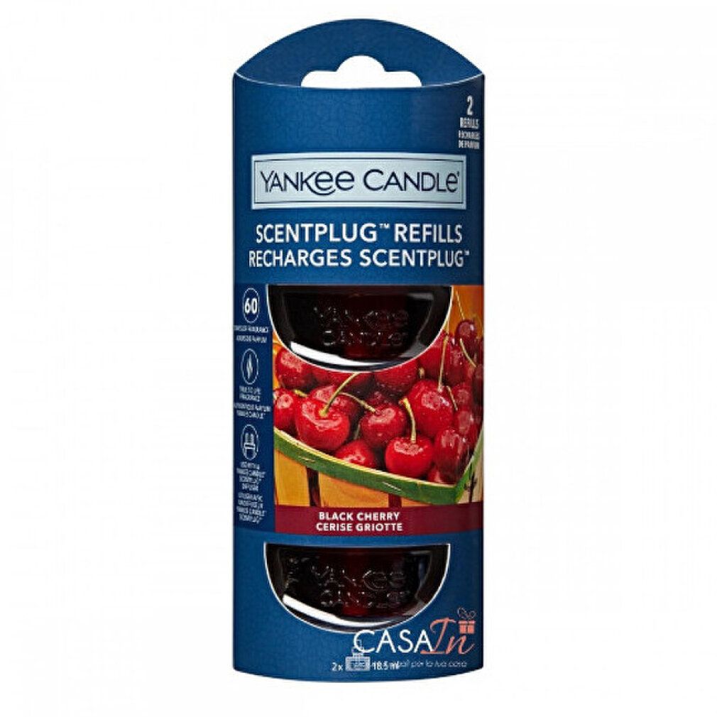 Confezione di due ricariche Yankee Candle Scentplug. Motivo ciliegia nera con ciliegie. Confezione blu con nome e loghi del prodotto.