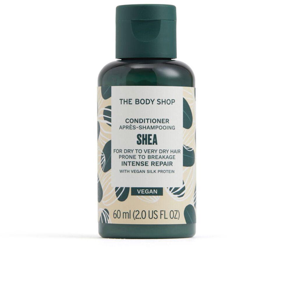 Flacone verde di balsamo 'The Body Shop'. 'Shea' per capelli secchi. Vegano. Con tappo.