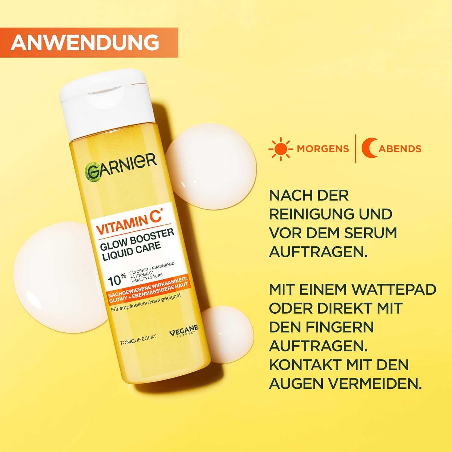 Garnier Vitamin C Glow Booster Liquid Care. Flacone giallo, tappo bianco. Testo: Applicazione: Mattina e sera. Applicare con un batuffolo.