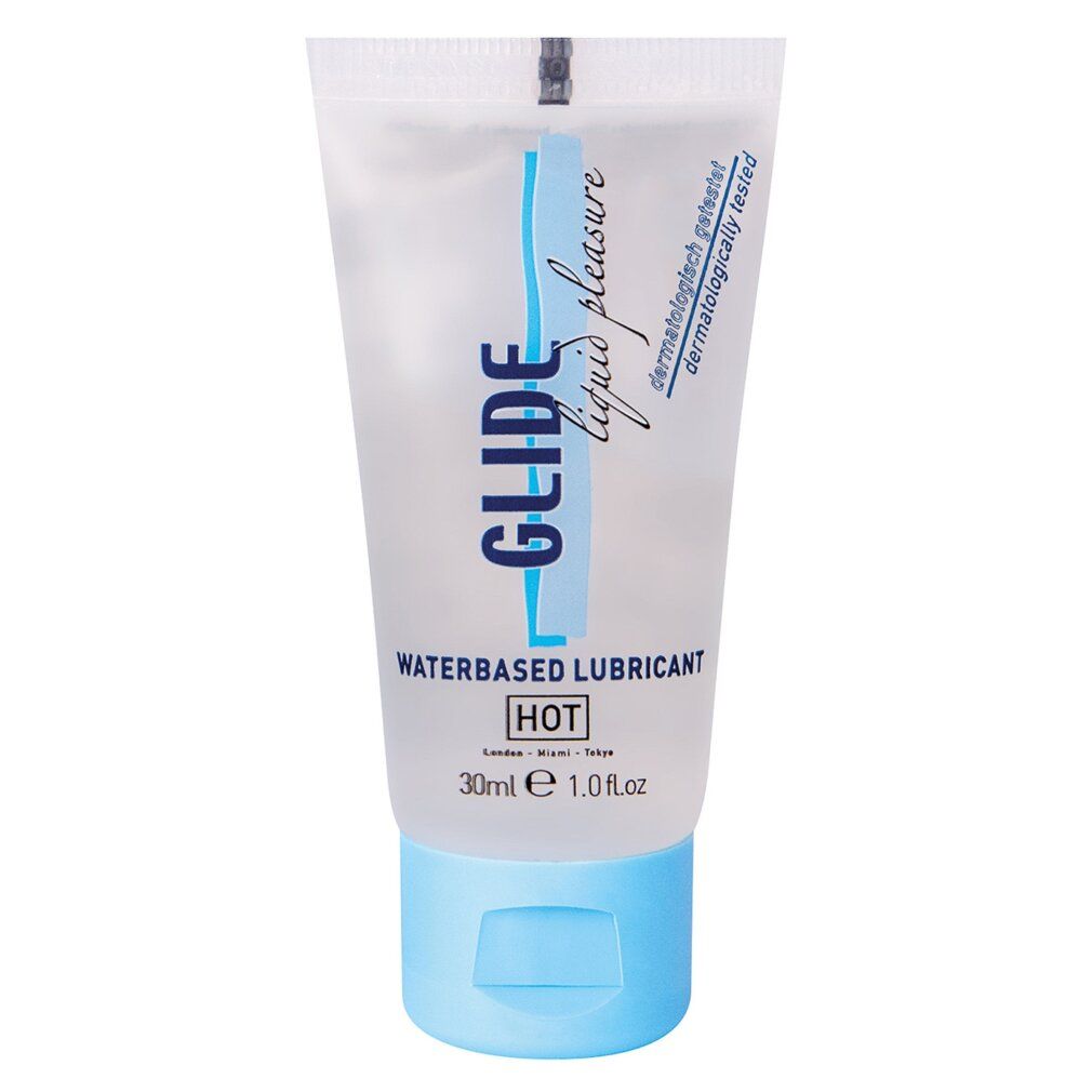 Tubo trasparente con tappo blu. Scritta: GLIDE liquid pleasure, WATERBASED LUBRICANT, HOT. Dermatologicamente testato.