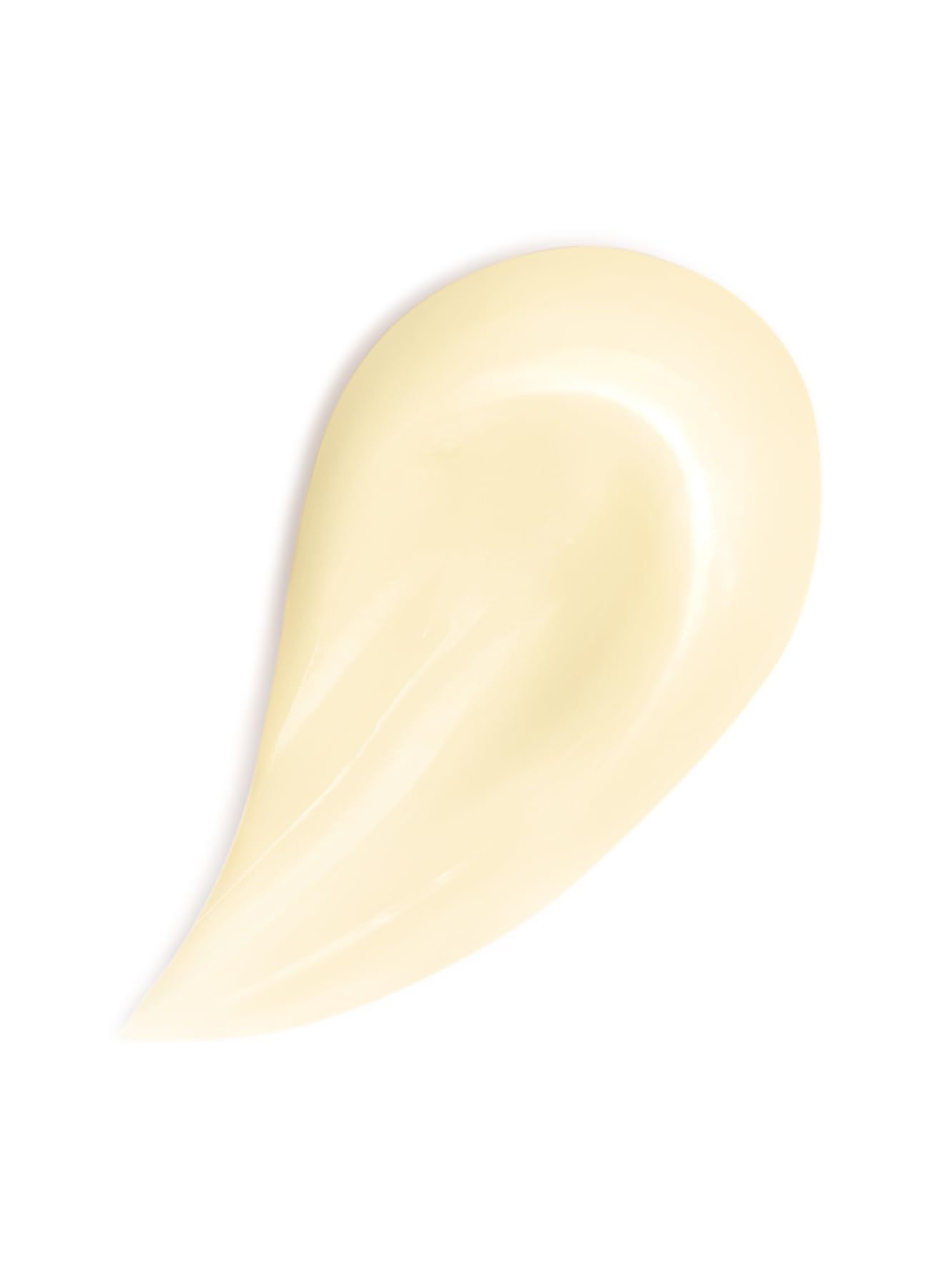 Campione di crema a forma di goccia. Texture chiara, color crema su sfondo bianco.