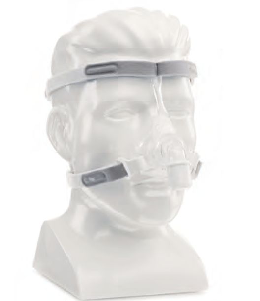 Maschera Philips Pico con fascia e valvola di espirazione su un busto.