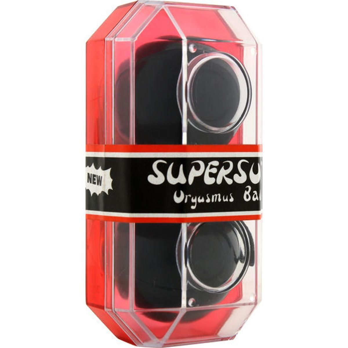 Due sfere nere in confezione trasparente rossa. Scritta: SUPERSOFT Orgasmus Balls.