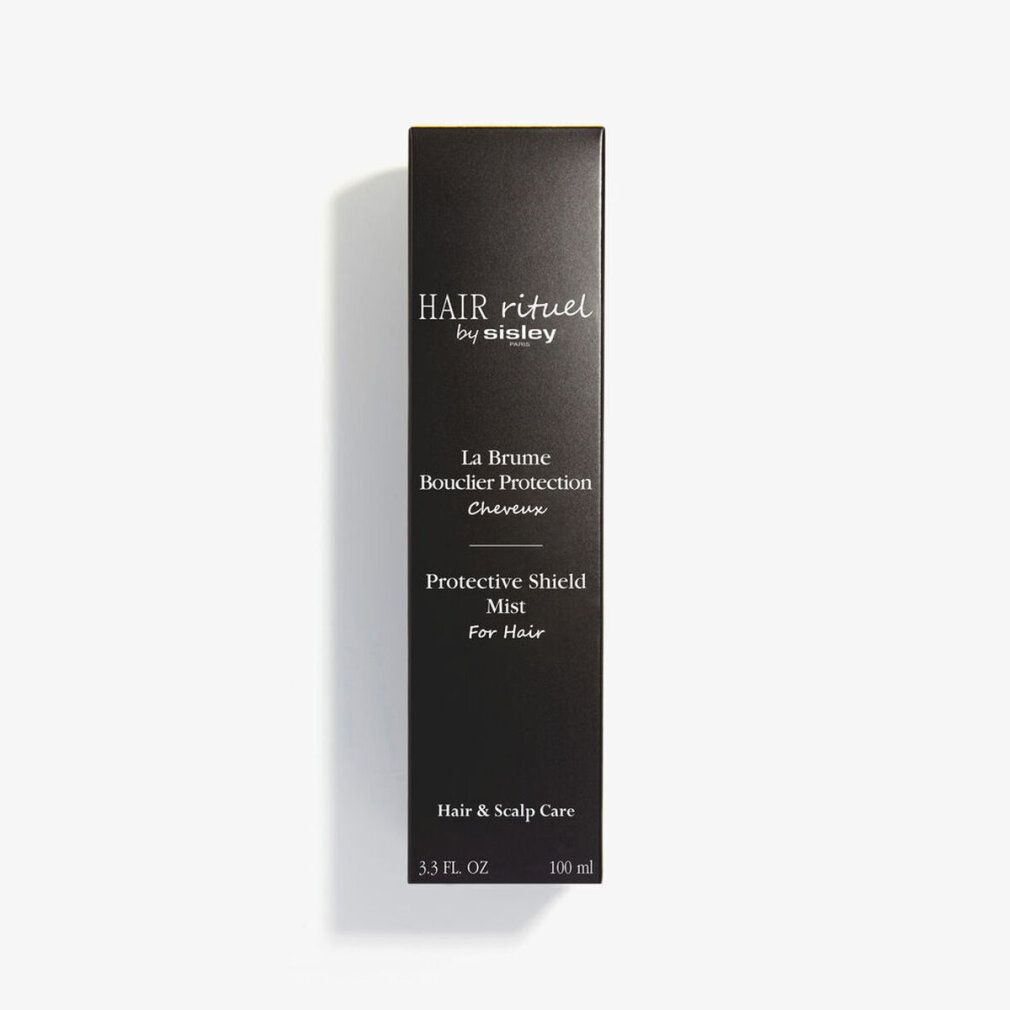 Confezione nera con scritte: HAIR rituel by sisley, La Brume Bouclier Protection, Protective Shield Mist. 3.3 FL. OZ. 100 ml.