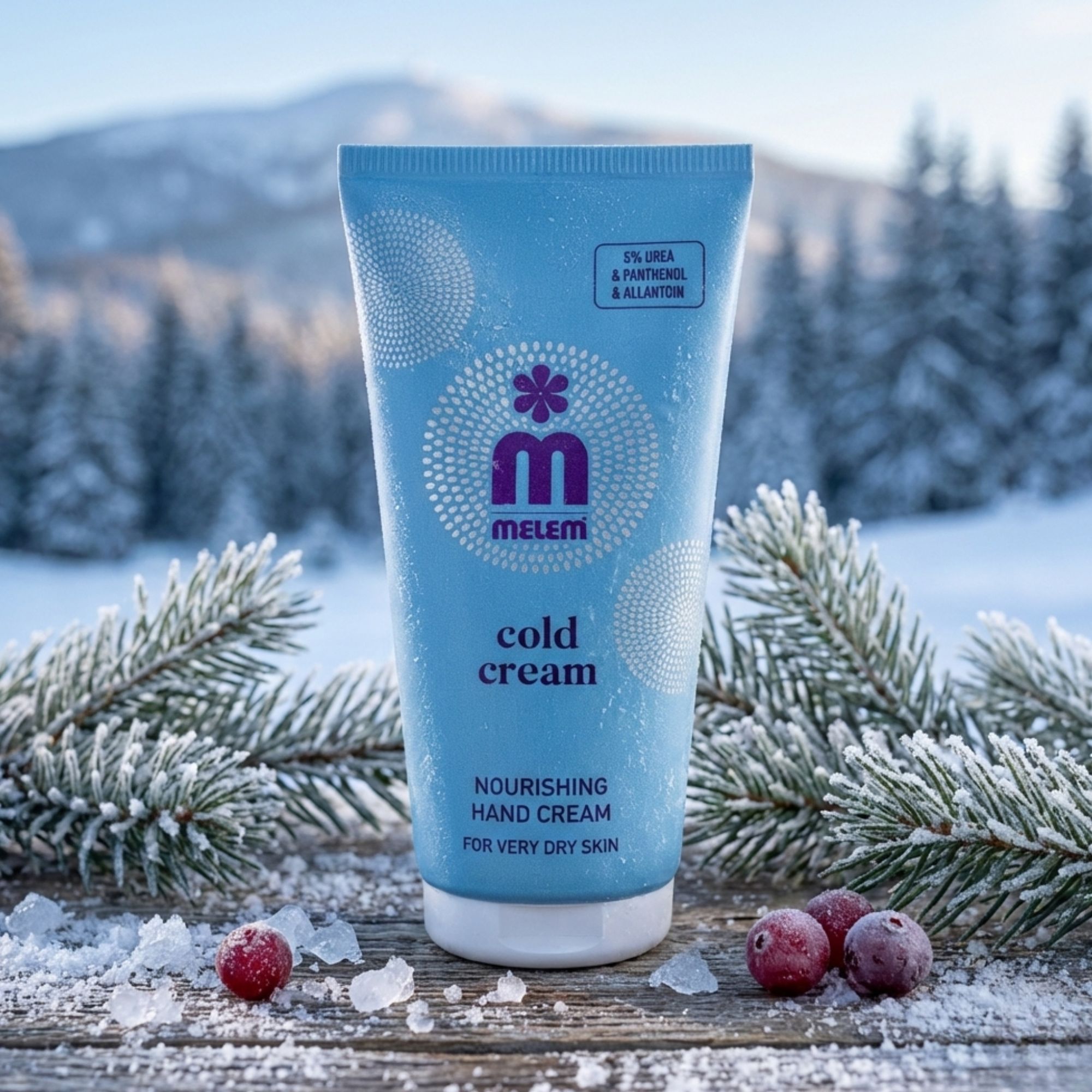 Tubo blu chiaro "Melem Cold Cream". Scritta: "Nourishing Hand Cream for very dry skin". Sfondo: paesaggio innevato.