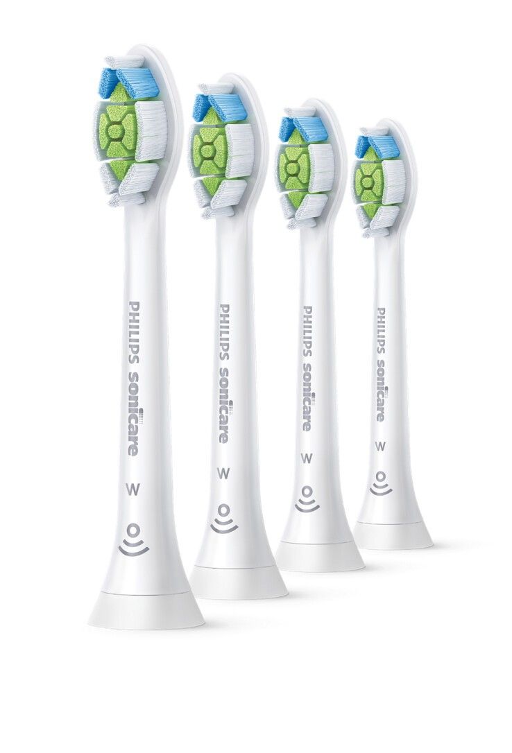 Quattro testine bianche Philips Sonicare. Setole verdi e blu. Scritta "Philips Sonicare".