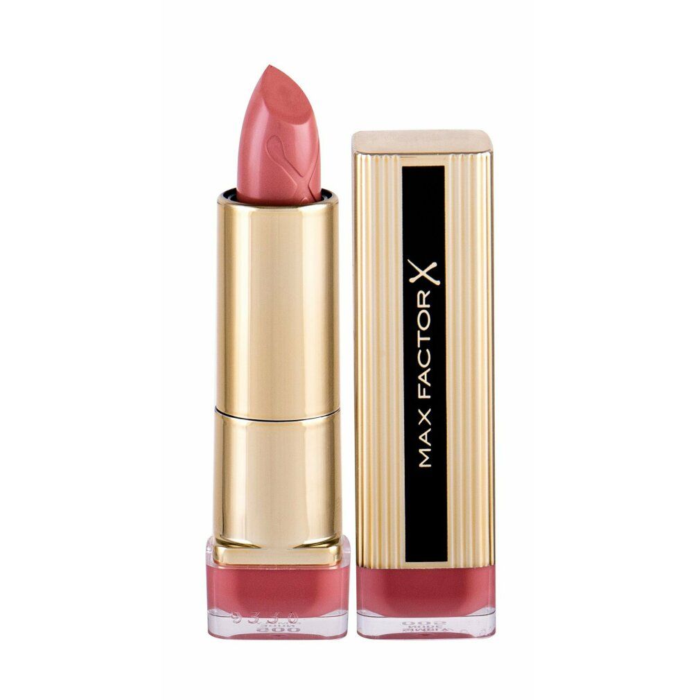 Rossetto rosso in astuccio dorato aperto. Punta del rossetto con motivo. Scritta nera e dorata: MAX FACTOR X.
