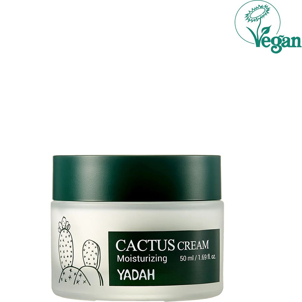 Barattolo di crema con coperchio verde. Scritta: Cactus Cream, Yadah. 50 ml. Illustrazione di cactus. Logo vegano.