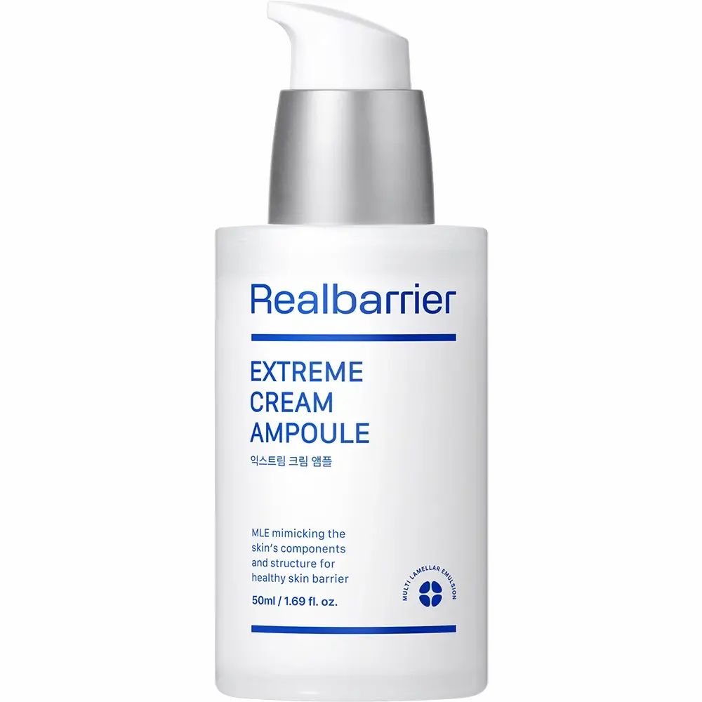 Flacone bianco con erogatore argentato. Scritte: Realbarrier, Extreme Cream Ampoule. Linee e testo blu.