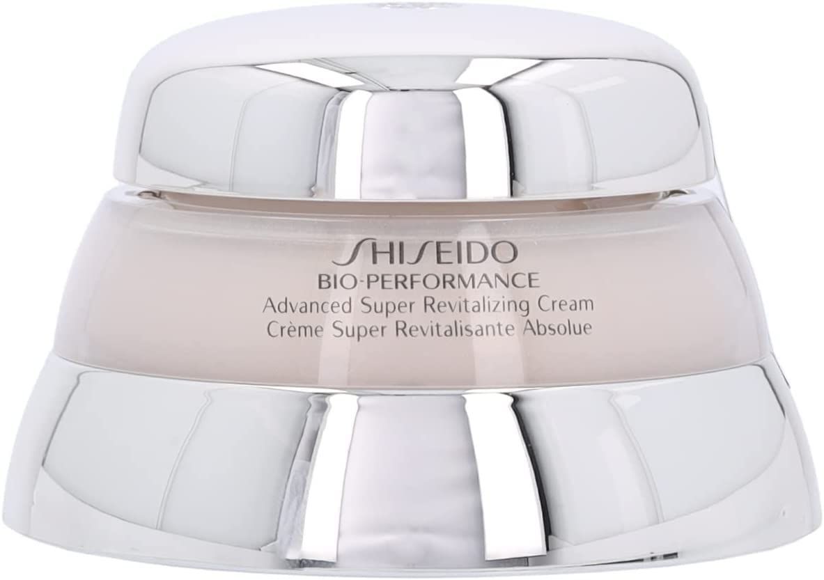 Vaso di crema con bordo argentato e coperchio bianco. Scritta: SHISEIDO BIO-PERFORMANCE Advanced Super Revitalizing Cream. Contenuto della crema visibile.