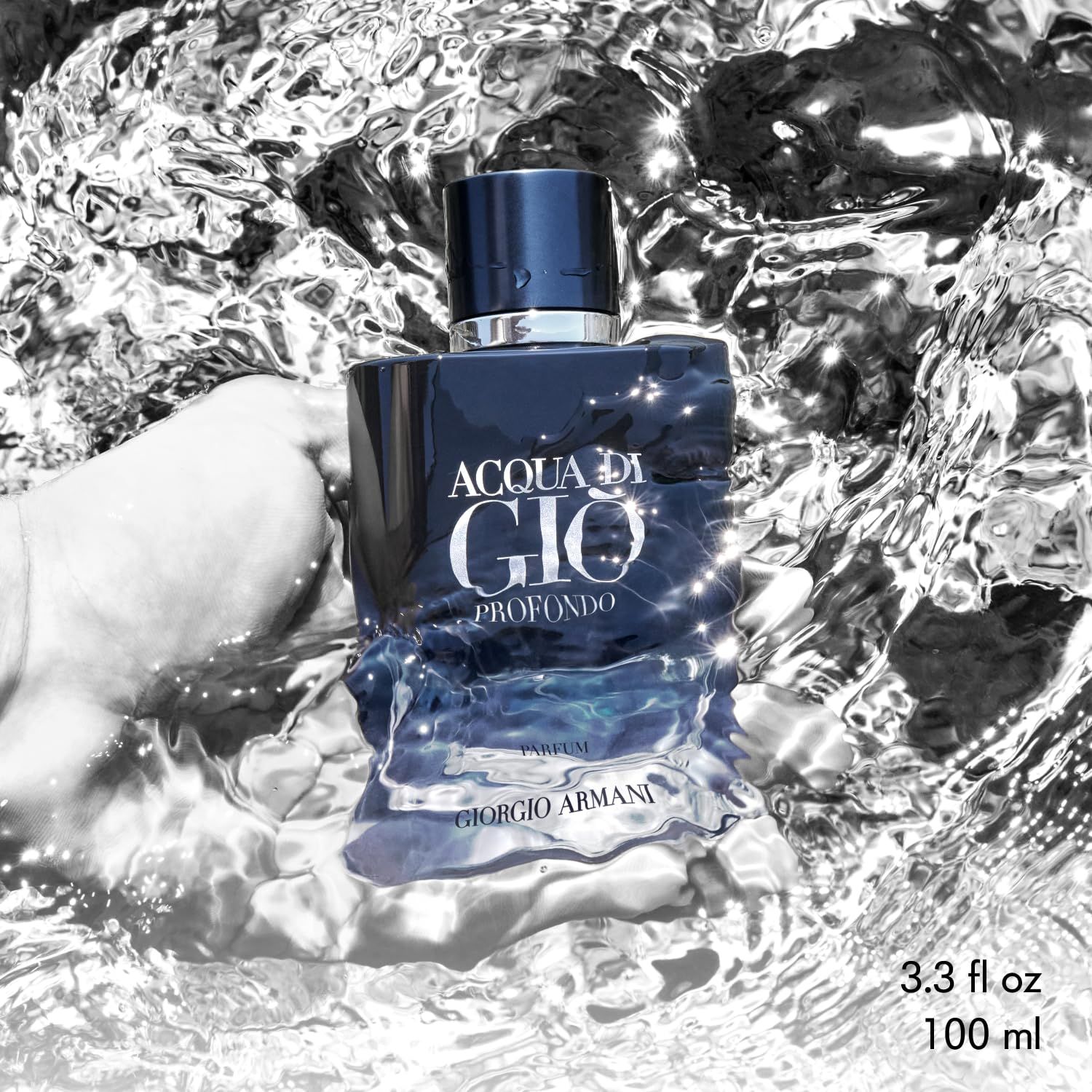 Flacone blu-trasparente nell'acqua. Testo: Acqua di Giò Profondo, Parfum, Giorgio Armani. 3.3 fl oz 100 ml.