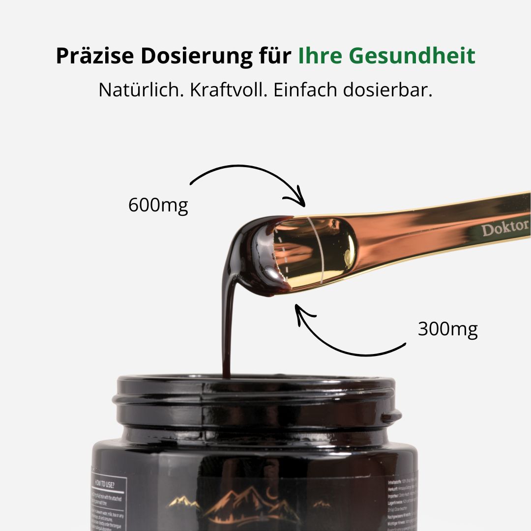 Cucchiaio dosatore con resina di shilajit. Testo: Dosaggio preciso per la tua salute. 600mg, 300mg.