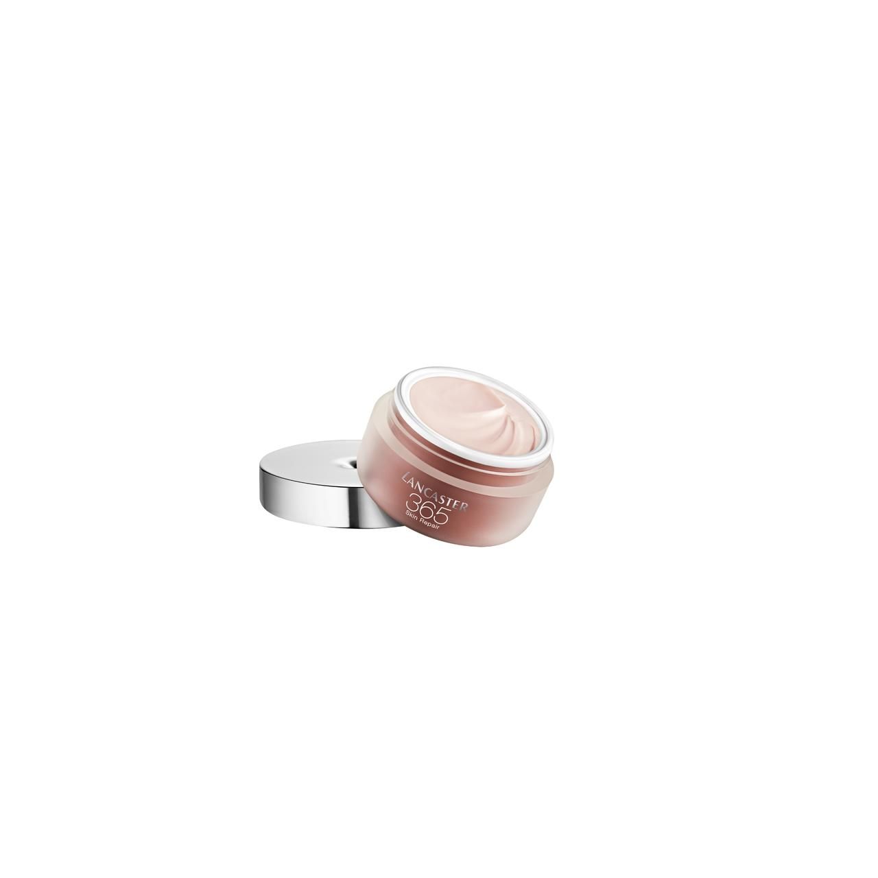 Vaso di crema aperto con crema rosa. Coperchio argentato accanto. Scritta: Lancaster 365.