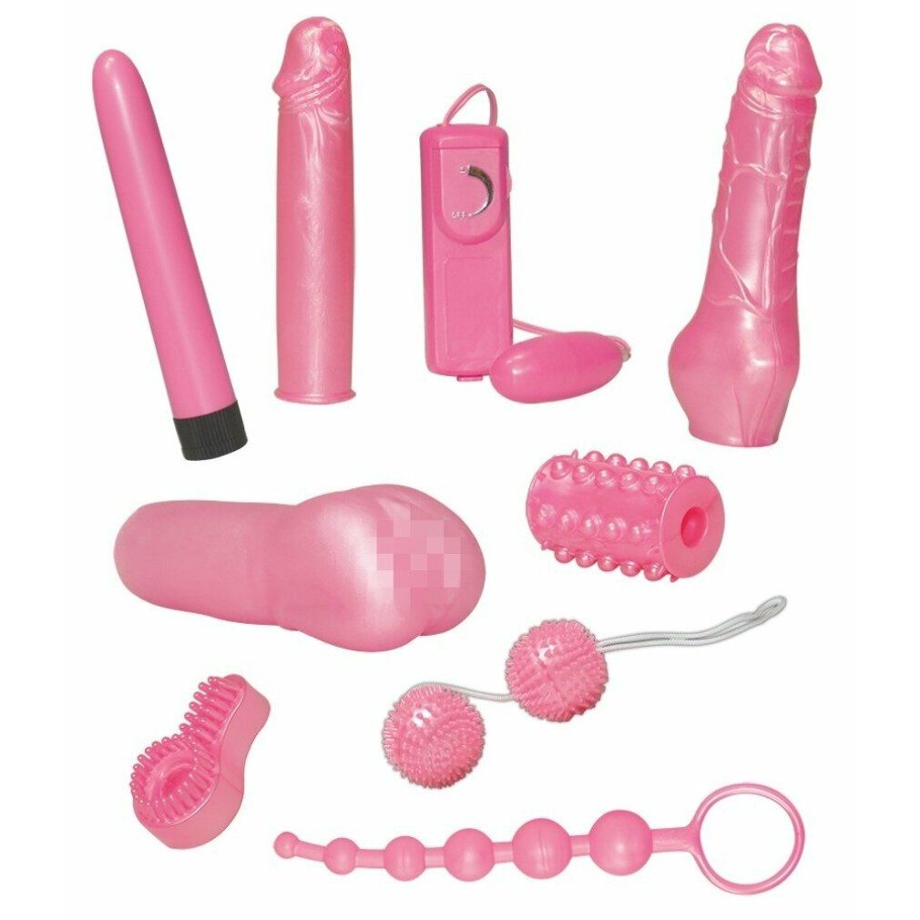 Set di giocattoli rosa con varie forme e dimensioni. Include vibratori, perle anali e altri prodotti.
