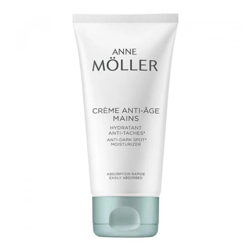 Tubo bianco con tappo blu. Scritta: ANNE MÖLLER, CRÈME ANTI-ÂGE MAINS, HYDRATANT ANTI-TACHES, MOISTURIZER.